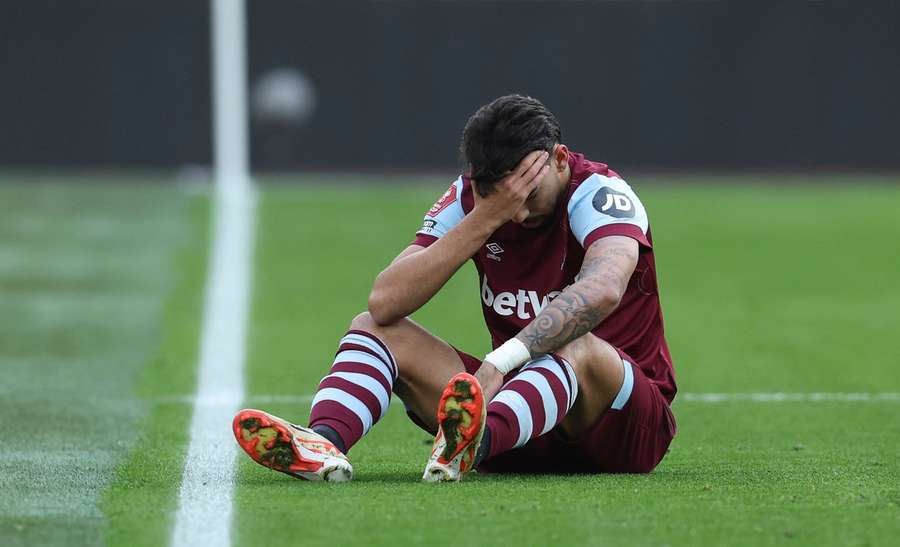 West Ham's Lucas Paqueta holds his leg after picking up an injury during the FA Cup match against Bristol City