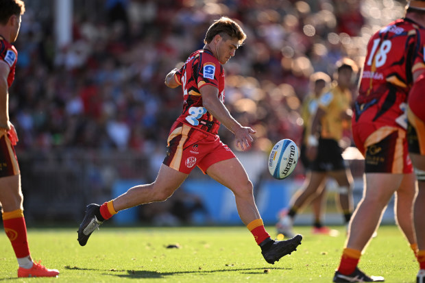 James O'Connor of the Crusaders kicks the ball.