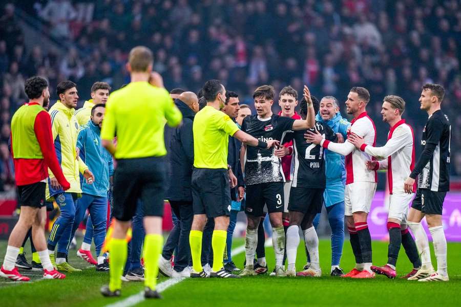 Ajax and AZ players got caught up in a frenzy after Alexandre Penetra's dismissal