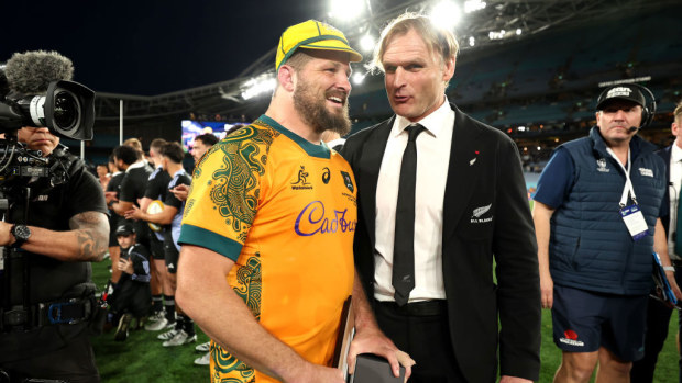 James Slipper of the Wallabies is congratulated by Scott Robertson.