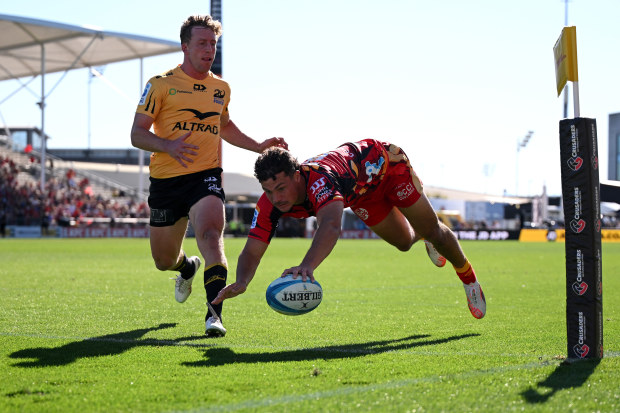 Macca Springer of the Crusaders scores a try.