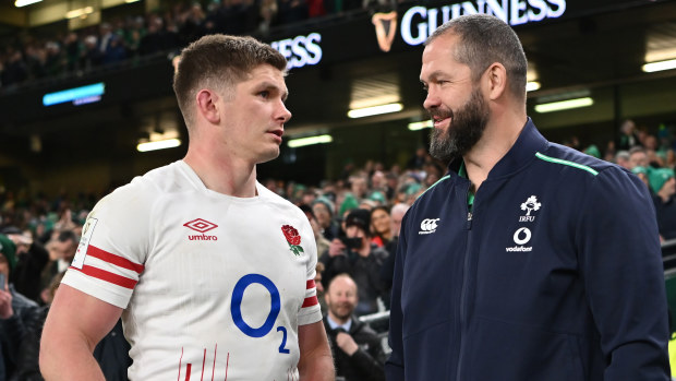 Owen Farrell of England speaks with Andy Farrell of Ireland.