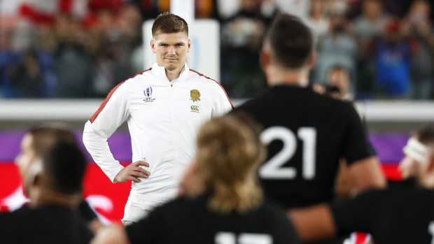 Owen Farrell of England faces the haka.