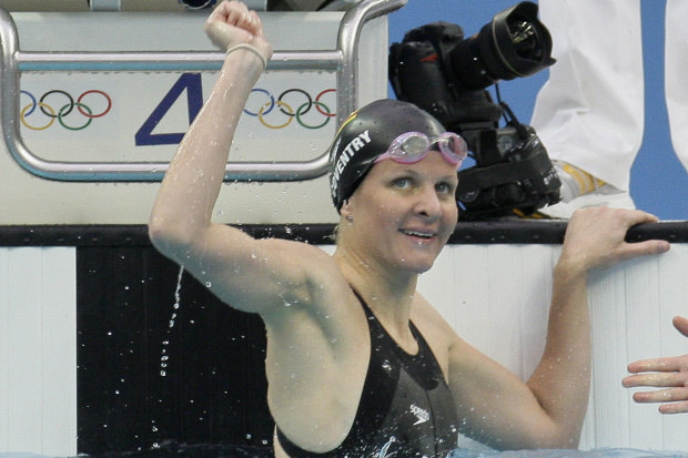 Zimbabwe's Kirsty Coventry reacts after setting a new world record in the women's 100m backstroke in 2008.