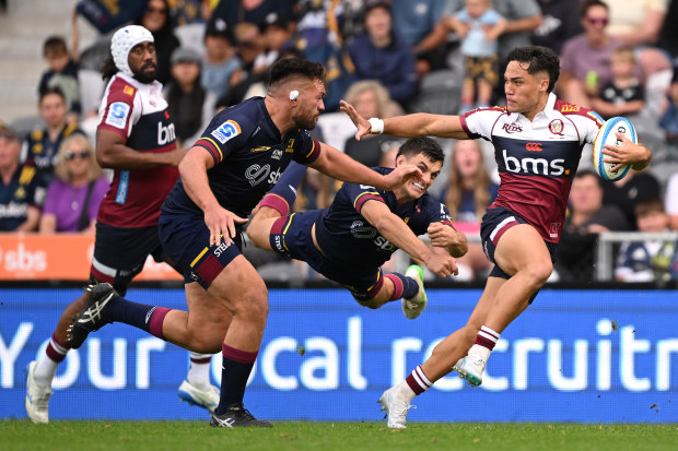 Kalani Thomas of the Reds charges forward.