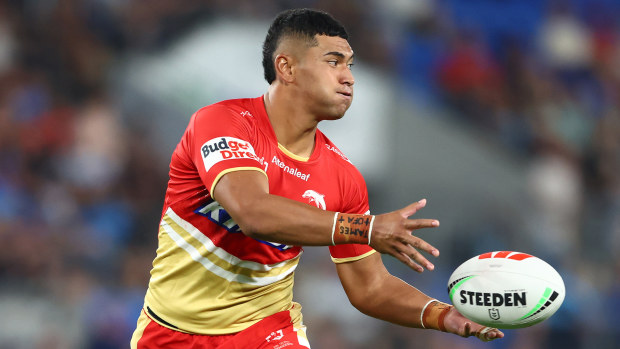 Isaiya Katoa of the Dolphins passes.