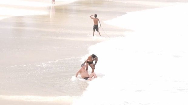 Wallabies star Brandon Paenga-Amosa in action with his Coogee surf rescue.