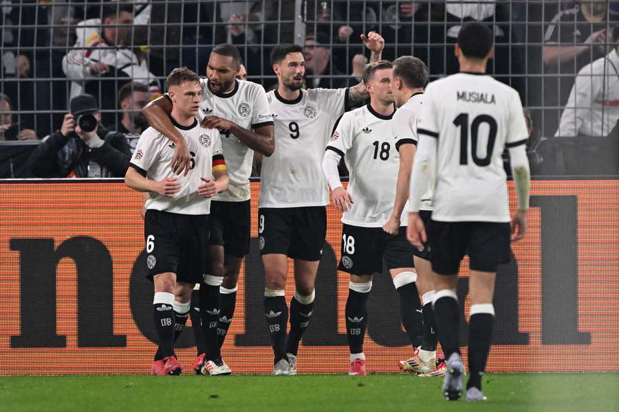 Joshua Kimmich celebrates his opening goal for Germany