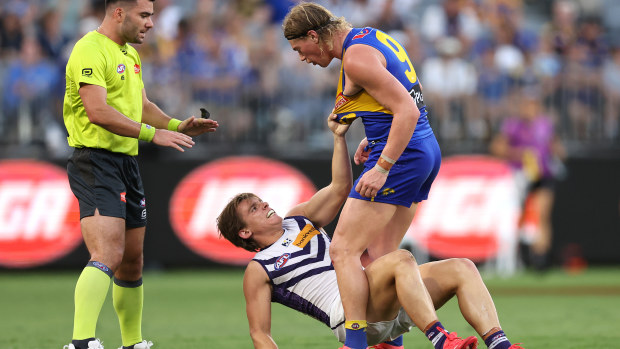 Harley Reid of the Eagles clashes with Caleb Serong of the Dockers during the round three AFL match between West Coast Eagles and Fremantle Dockers