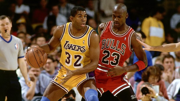 Magic Johnson posts up on Michael Jordan in 1991.