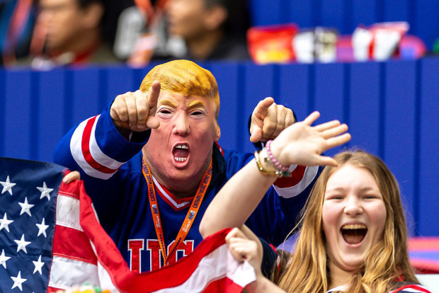 Fans of United States cheer during the Hong Kong Sevens at Kai Tak Stadium.