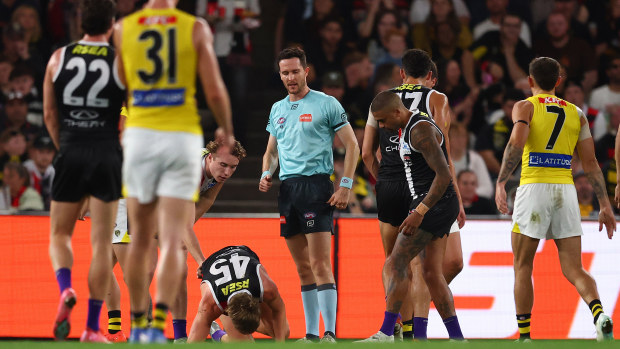 Liam O'Connell goes down injured during the round three match between St Kilda and Richmond.