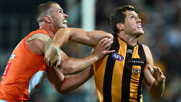 Hawthorn ruckman Lloyd Meek and GWS ruckman Kieren Briggs.