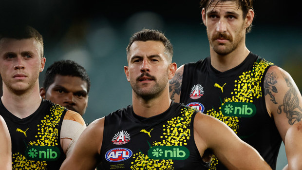 Jack Graham, Sam Naismith and Daniel Rioli of the Tigers look on during the 2024 AFL Round 07 match between the Richmond Tigers and the Melbourne Demons at the Melbourne Cricket Ground on April 24, 2024 in Melbourne, Australia. (Photo by Dylan Burns/AFL Photos via Getty Images)