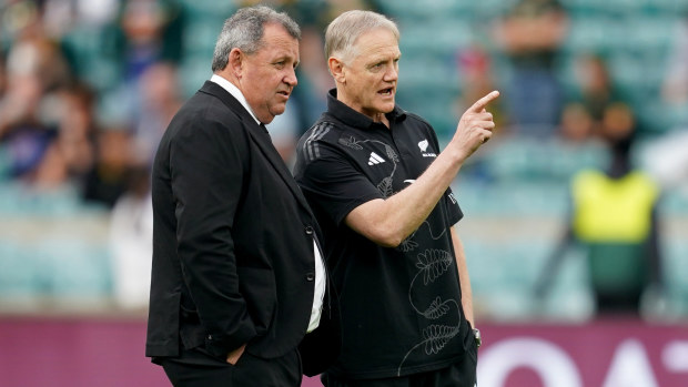 Ian Foster interacting with Joe Schmidt at Twickenham.