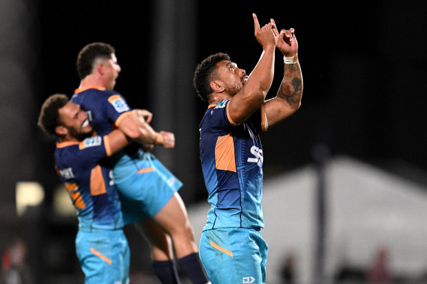 Ardie Savea of Moana Pasifika celebrates after winning.
