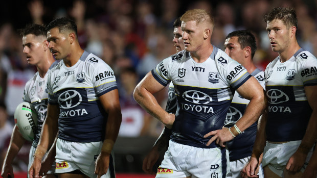 Griffine Neame and his Cowboys teammates look stunned during their round-one match against the Sea Eagles.