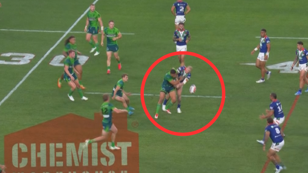 Raiders captain Joe Tapine is penalised for a shoulder charge on Warriors skipper Mitch Barnett.