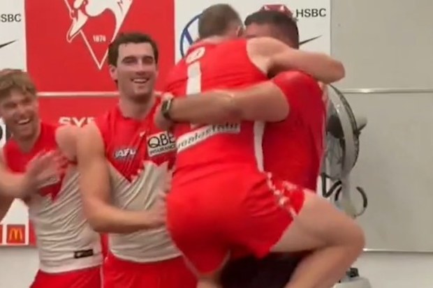 Chad Warner leaps into Dean Cox's arms.