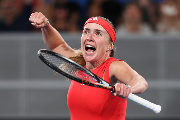 Elina Svitolina of Ukraine celebrates winning match point against Jasmine Paolini of Italy.