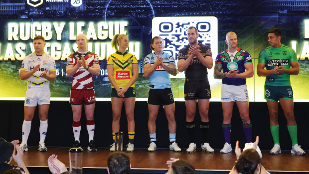 George Williams of the Warrington Wolves, Liam Farrell of the Wigan Warriors, Kezie Apps of the Australian Jillaroos, Cameron McInnes of the Cronulla Sharks, Isaah Yeo of the Penrith Panthers, Mitchell Barnett of the Warriors, and Joseph Tapine of the Canberra Raiders represent their clubs at the NRL Las Vegas media launch.