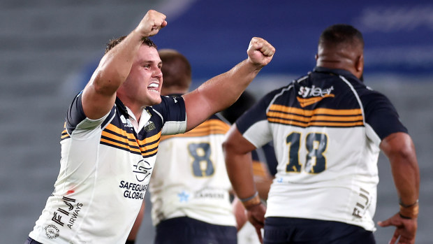 Blake Schoupp of the Brumbies celebrates on fulltime.