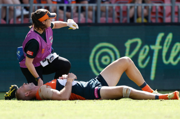 Kieren Briggs of the Giants is seen injured.