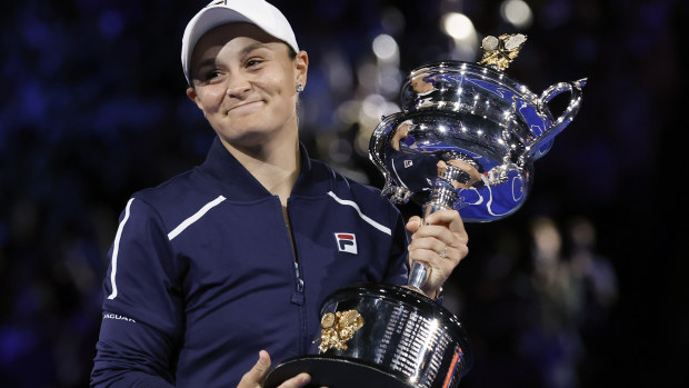Ash Barty of Australia holds the Daphne Akhurst Memorial Cup after defeating Danielle Collins of the U.S., in the women's singles final at the Australian Open tennis championships in Saturday, Jan. 29, 2022, in Melbourne, Australia.