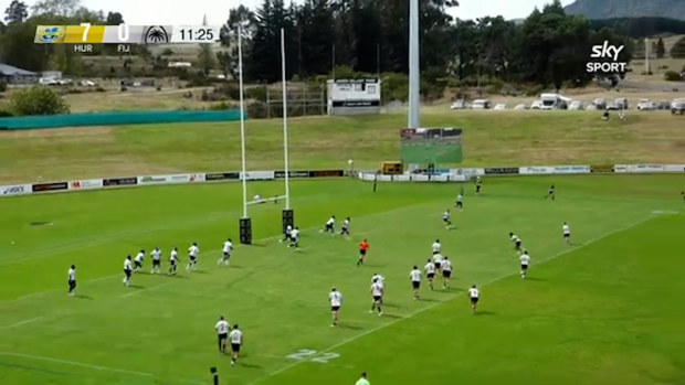 The Hurricanes and Fiji under-20s teams played in near identical kit.