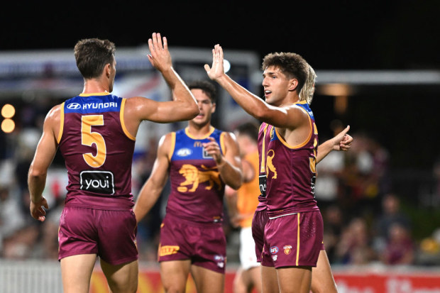 Zac Bailey of the Lions celebrates kicking a goal during the 2025 AAMI AFL Community Series.