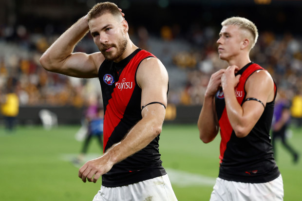 Ben McKay trudges off after Essendon's loss to Hawthorn at the MCG.