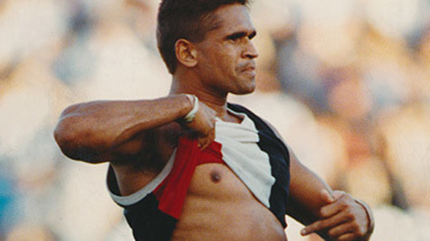 Nicky Winmar bares chest at opposition football fans in 1993 (Wayne Ludbey/The Age)