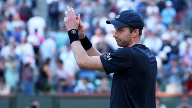 Botic van de Zandschulp of the Netherlands acknowledges the crowd after his victory against Novak Djokovic.