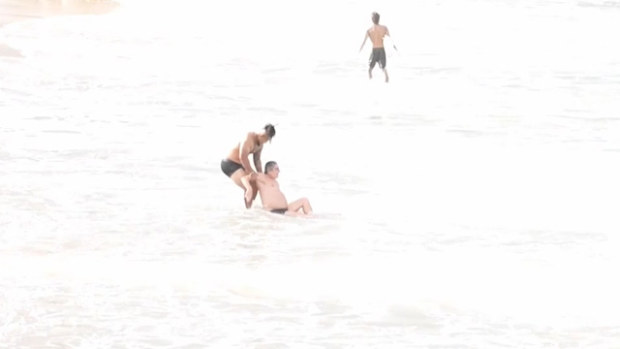 Wallabies star Brandon Paenga-Amosa in action with his Coogee surf rescue.