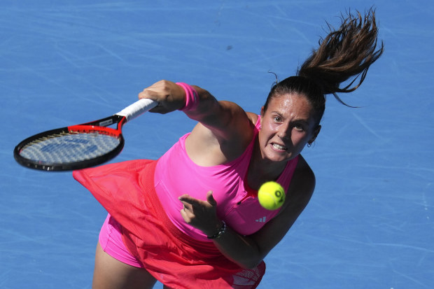 Daria Kasatkina serves to Viktoriya Tomova during their first round match at the Australian Open in Melbourne, Australia, Jan. 14, 2025. (AP Photo/Vincent Thian)