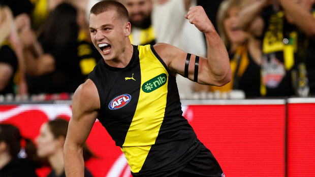 Sam Lalor of the Tigers celebrates his first league goal.