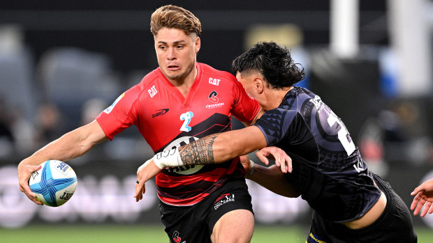 James O'Connor of the Crusaders charges ahead.