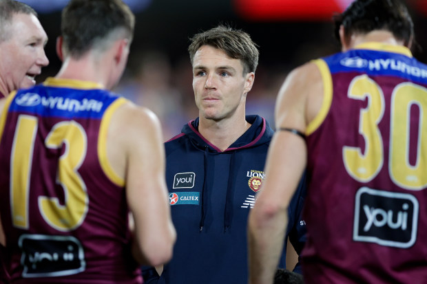 BRISBANE, AUSTRALIA - MAY 05: Lincoln McCarthy of the Lions is seen during the three quarter time huddle during the 2024 AFL Round 8 match between the Brisbane Lions and the Gold Coast SUNS at The Gabba on May 05, 2024 in Brisbane, Australia. (Photo by Russell Freeman/AFL Photos via Getty Images)