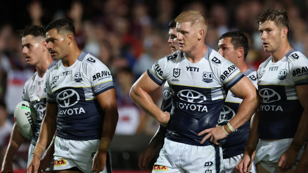 Griffine Neame and his Cowboys teammates look stunned during their round-one match against the Sea Eagles.