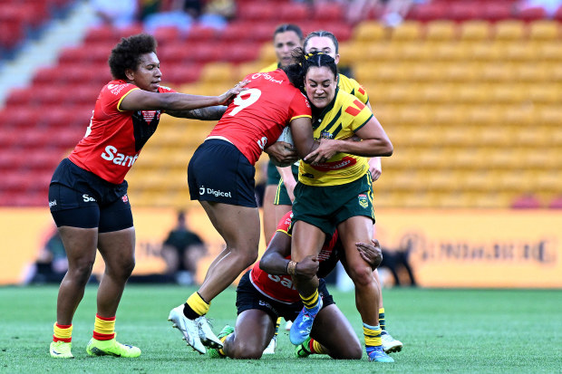 Yasmin Clydsdale of the Jillaroos is tackled during the women's 2024 Pacific Championships match between Australia Jillaroos and PNG Orchids at Suncorp Stadium on October 18, 2024 in Brisbane, Australia. (Photo by Bradley Kanaris/Getty Images)