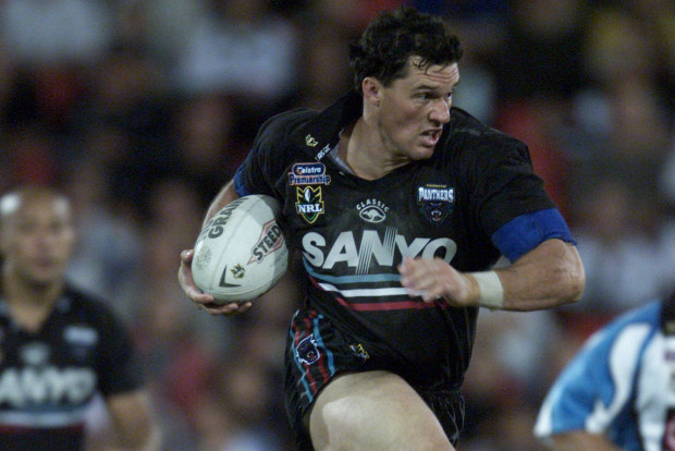 Matt Adamson bursts through during a run for Penrith in 2004.