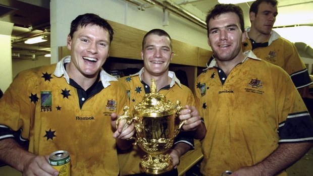 Matt Burke, Ben Tune and Owen Finegan of Australia.