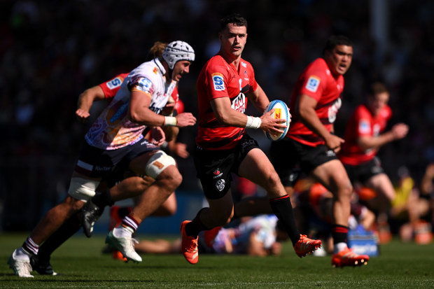 Will Jordan of the Crusaders charges forward.