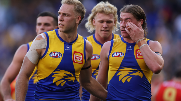 Oscar Allen and Harley Reid leave the field at half time during the round one AFL match between West Coast and Gold Coast.
