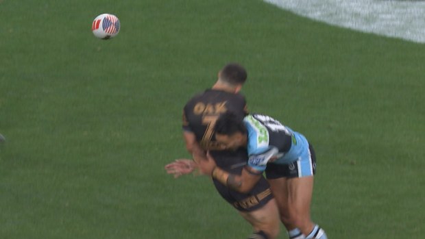 Nathan Cleary of the Penrith Panthers is winded by Briton Nikora.