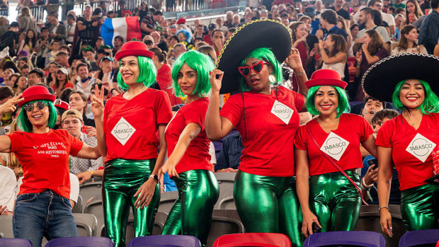 Fans pose for photo during the Hong Kong Sevens at Kai Tak Stadium.