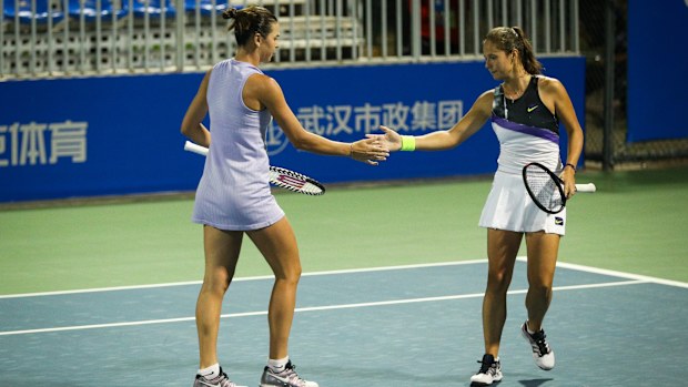 Daria Kasatkina and Ajla Tomljanovic play a women's double match together at the 2019 Wuhan Open.