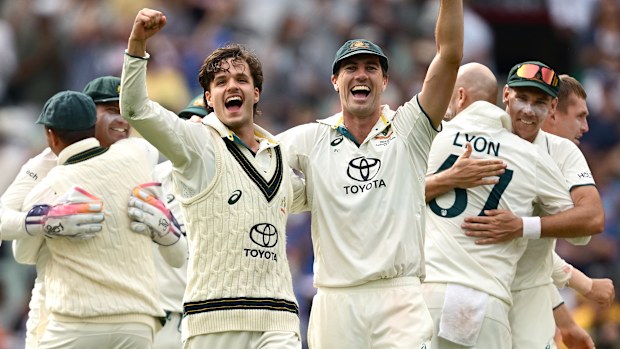 Sam Konstas and Pat Cummins celebrate at the MCG.