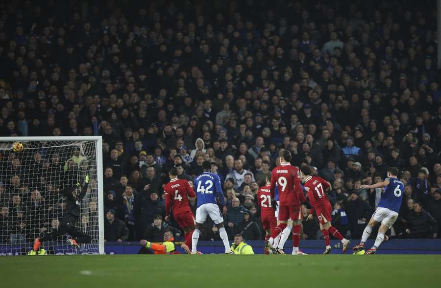 Everton's James Tarkowski scores an injury-time equaliser against Liverpool in a 2-2 draw in February 2025