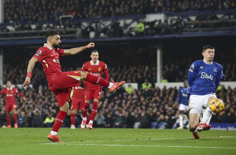 Liverpool's Mohamed Salah scores and celebrates his team's 2nd goal against Everton at Goodison Park in February 2025